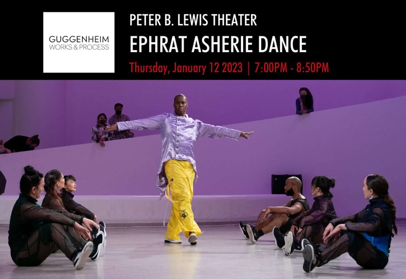 Dancers of various ages, gender, and racial and ethnic backgrounds sit on the ground, three on either side of club legend Archie Burnett, a Black man standing in the center with arms extended straight to the side wearing a silver jacket and yellow pants. The white wall of the background is lit in purple light.