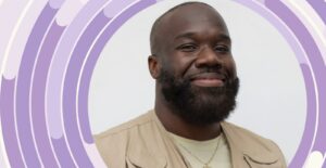 A headshot of Allen Kwabena Frimpong against a background of light purple concentric rings.
